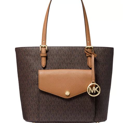 michael kors jet set medium pocket multifunction signature tote|michael kors carryall pale peanut.